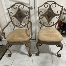 Two Metal Chairs With Marble Accent