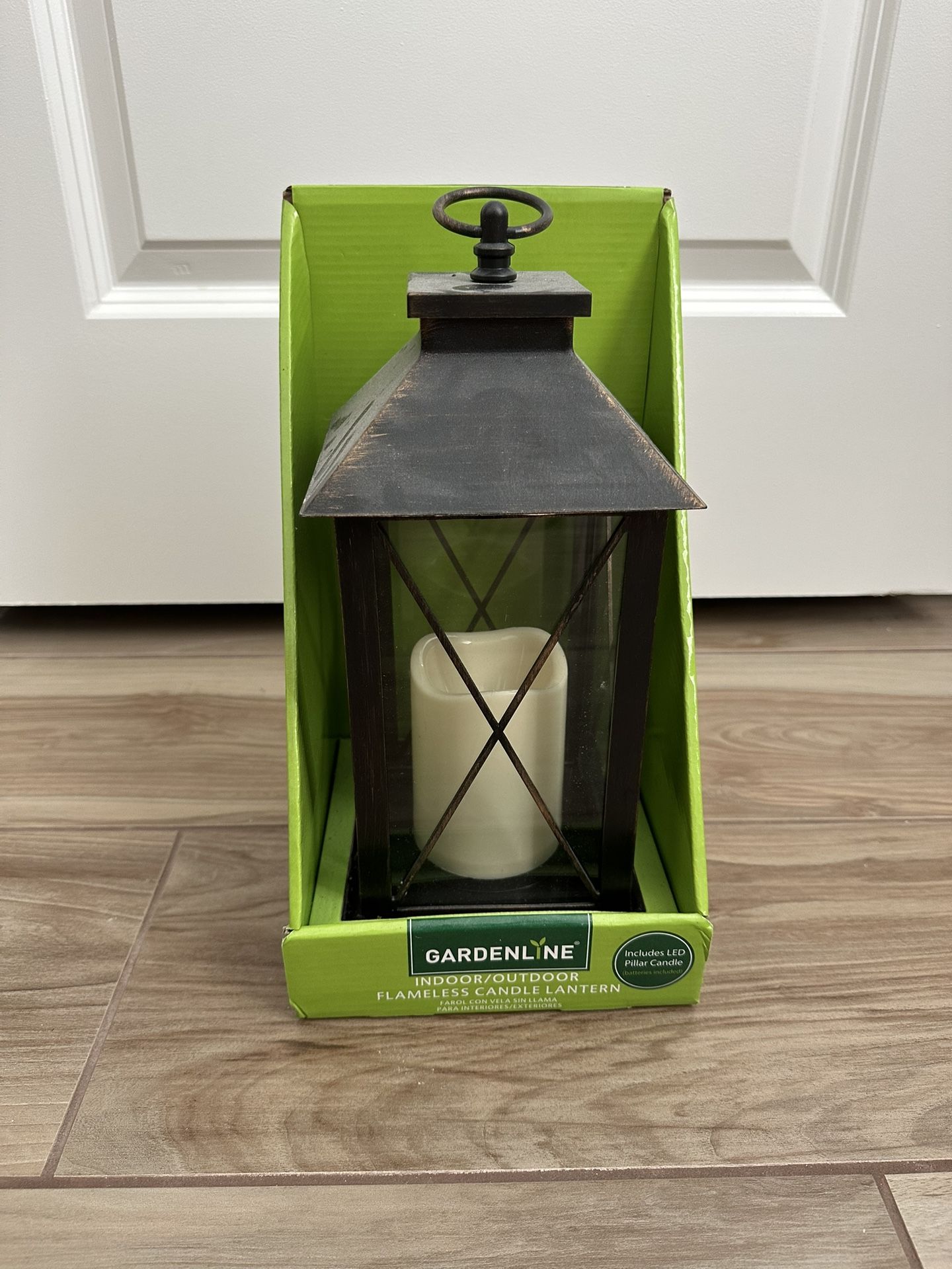 Lantern with flameless pillar candle