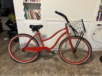 Red huffy beach cruiser