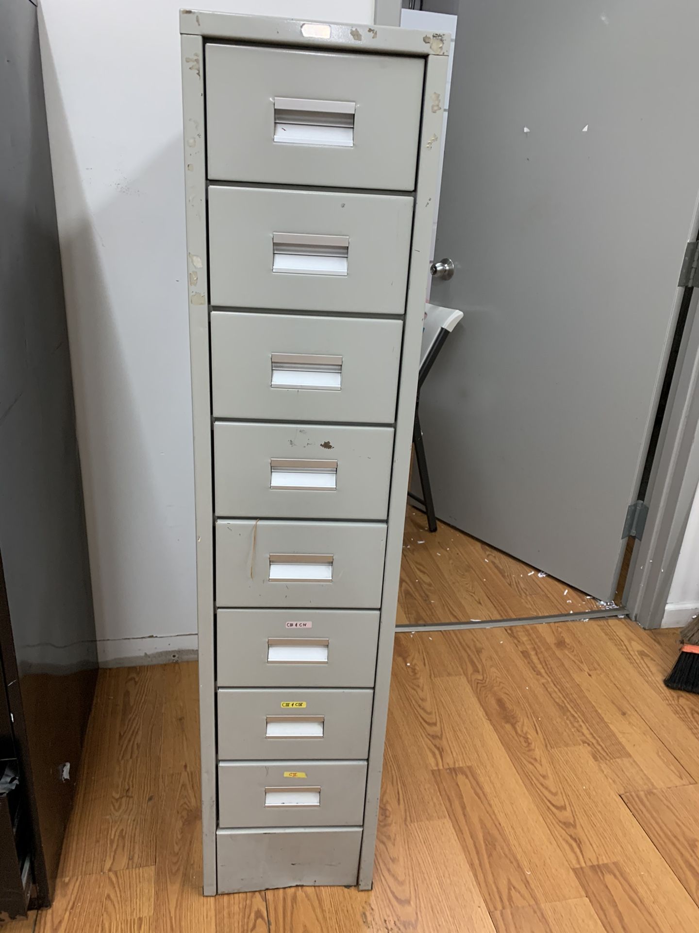 Metal Narrow file cabinet 55”Hx12”Wx 25”D