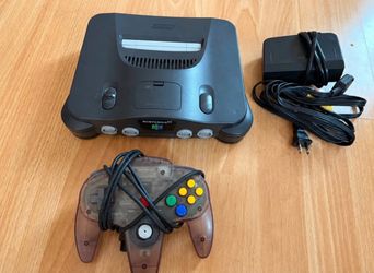 Nintendo 64 console with atomic purple controller