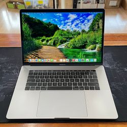 Apple MacBook Pro 15” 2019 6-CORE i7 32GB RAM 256GB RADEON PRO 555X 4GB Graphics