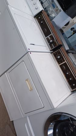 Kenmore top load washer and electric dryer set