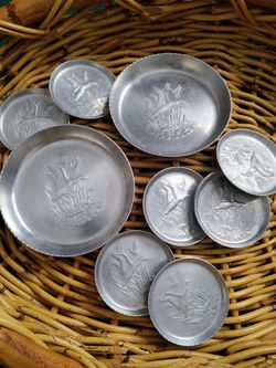 Set of 21 MCM aluminum servingware embossed with marsh ducks