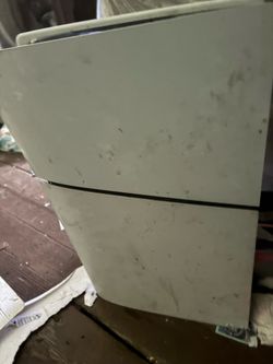 PlayStation 5 with two controllers