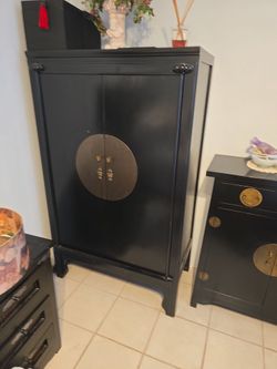 Qty 2 matching Black Asian-Style Cabinets with Brass Hardware