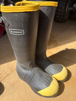 Lacrosse insulated rubber boots.