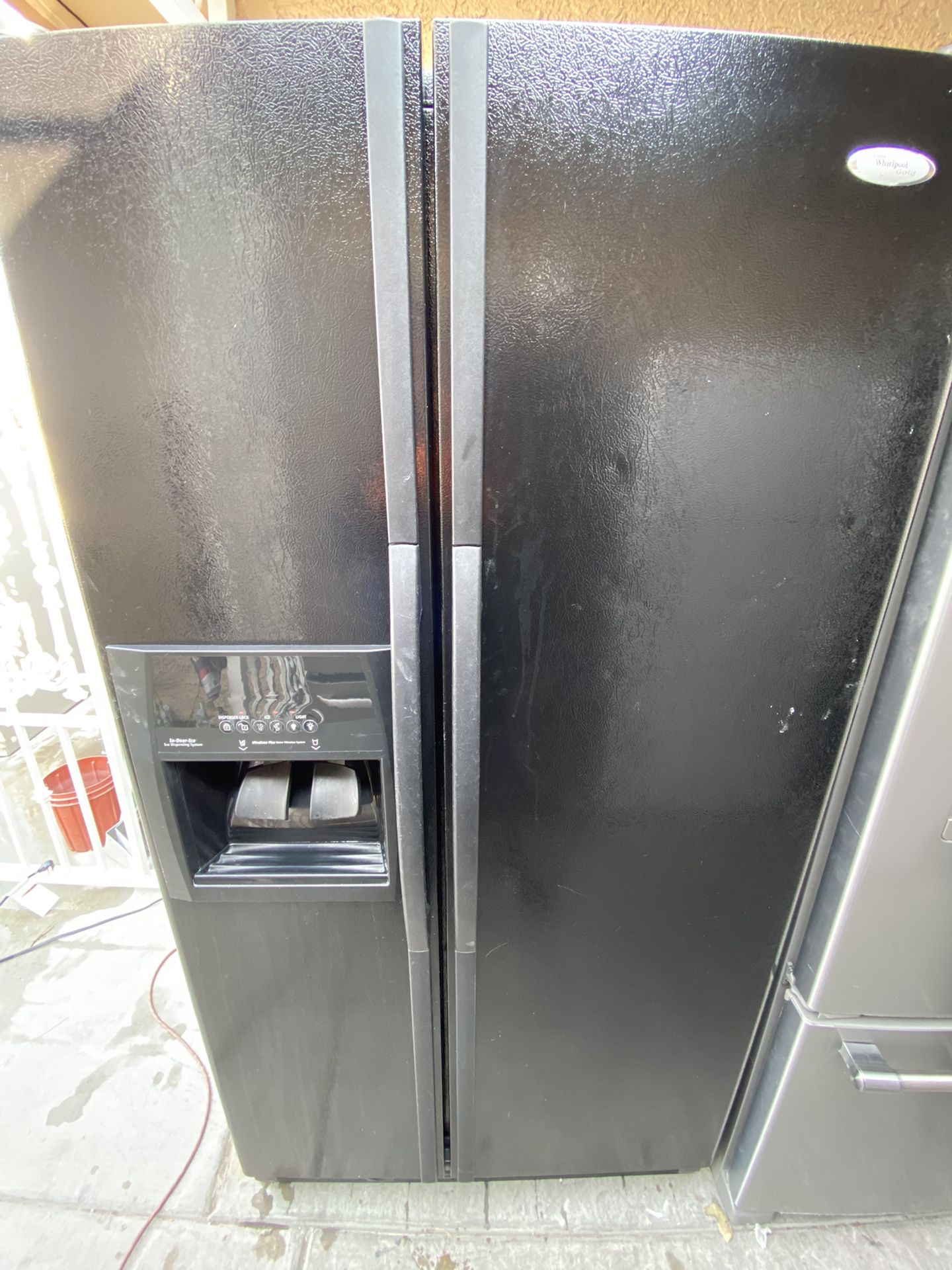 Whirlpool black refrigerator/fridge