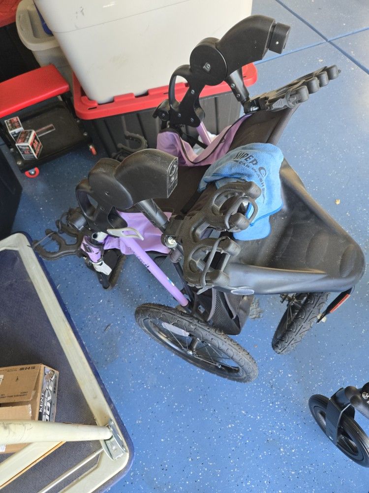 Child's Stroller Converted To Gun Rack Trap Or Skeet Shooting