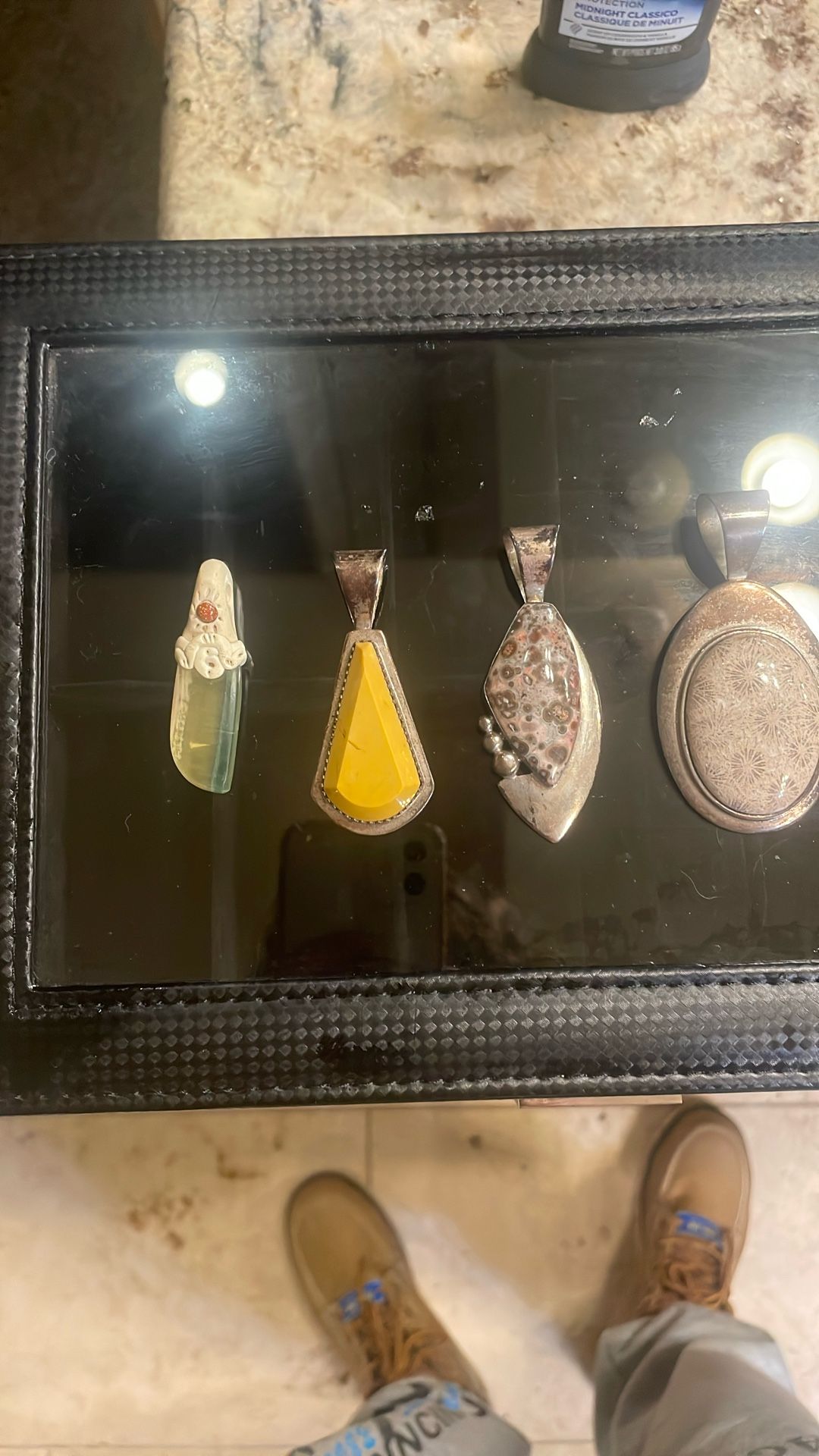 Silver and gym pendants