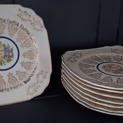 8 Royal China Featuring Warranted 22K Gold Filigree & Central Floral Design.