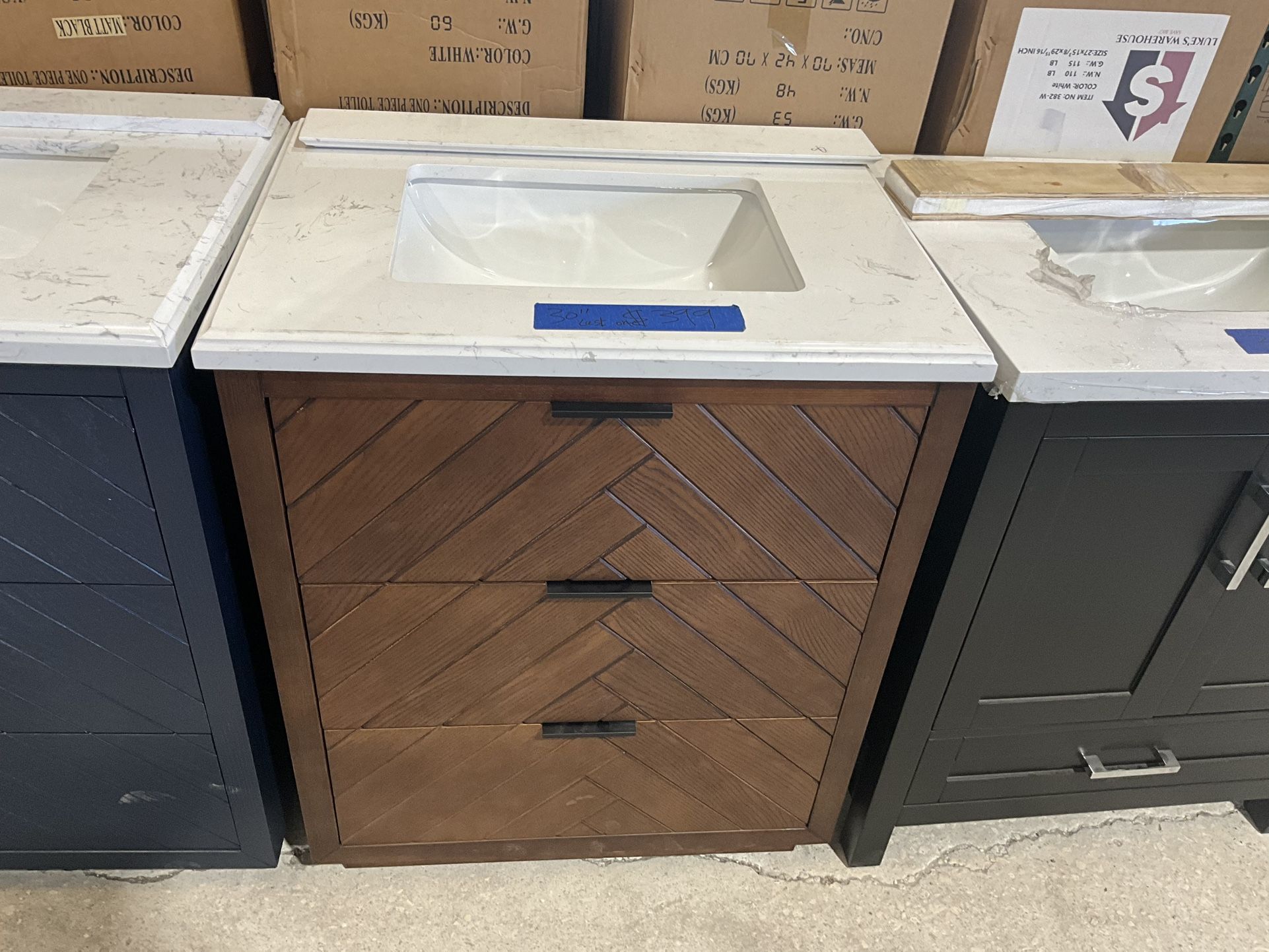 30” Bathroom Vanity in brown , single sink soft close solid wood with vanity top in white  $399  Luke’s liquidations warehouse Address:  2434 N Forsyt