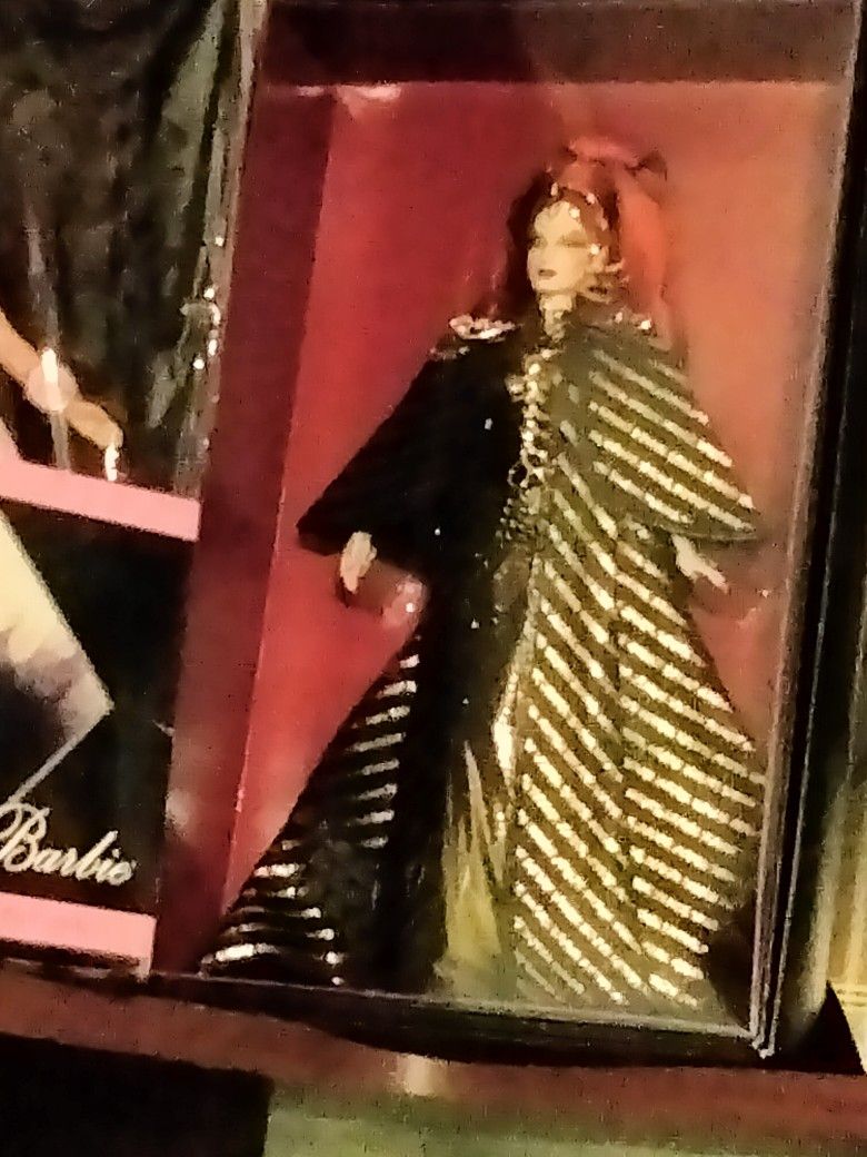 Barbies Colossian Barbie Is $150 Adams Family Barbie Is $150 Johnny Depp Is 100 Ellie May Clampett Is 200 Goldie Hawn Is 100 Double Barbie Sets