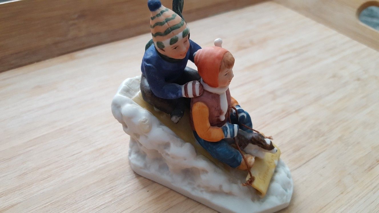 DOWNHILL RACER" PORCELAIN FIGURINE BY NORMAN ROCKWELL