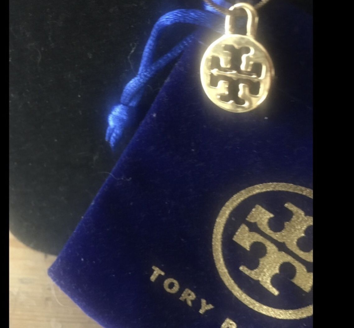 BEAUTIFUL Gold Tory Burch emblem pendant & High Quality 14kt Gold plate charm is on a link chain. See pictures.