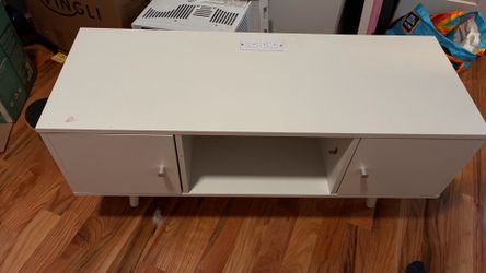 Jakerra TV Stand with Power Outlets and Adjustable Shelf White