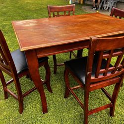 DINING TABLE AND 4 CHAIRS 