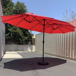 $130 (New in box) Large 15ft double sided outdoor umbrella w/ 65 lbs plastic weight base (red/gray)