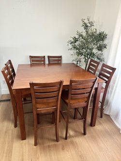 Solid Wood Pub table with 8 chairs