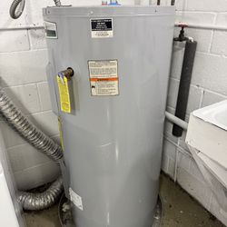 Working residential hot water heater. 