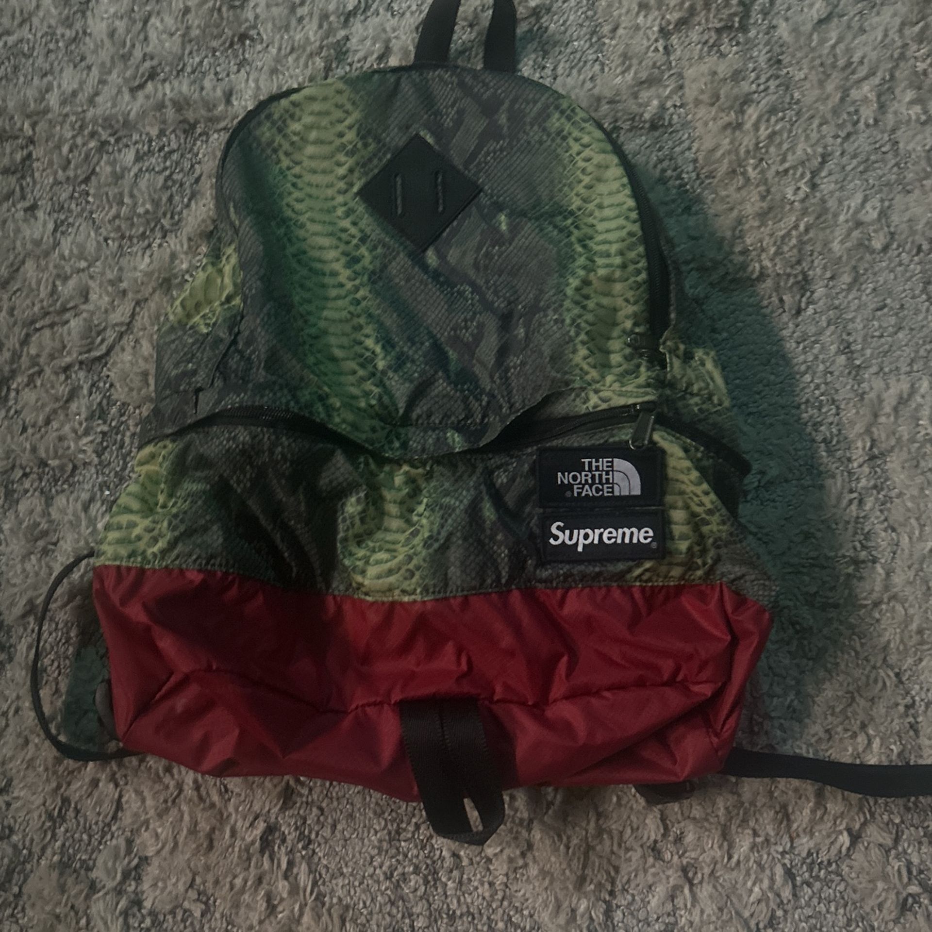 kids north face x supreme bookbag