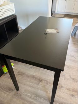 Table by Ashley