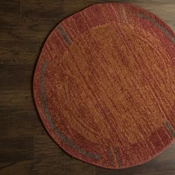 Bright orange, red and brown rugs