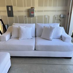 Living Spaces Log collection Sofa + Ottoman