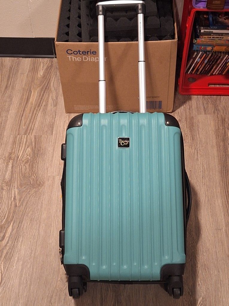 travels Club green suitcase
