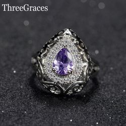 Woman ring Purple Ziconia Stone size 6