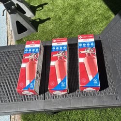 Three Small Fire Extinguishers