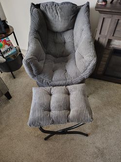 Comfy grey accent chair with ottoman
