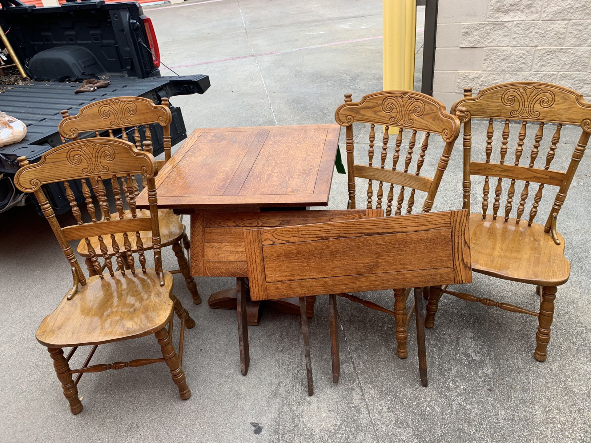 Wooden dinner table with 4 chairs