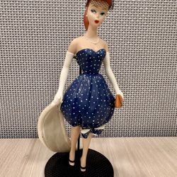 Barbie figurine  wearing Gay Parisienne 