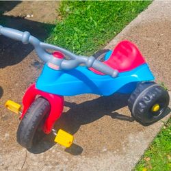 Fisher-Price three wheeler, Heavy duty plastic wheels, a storage under seat is included all in Excellent condition. 
