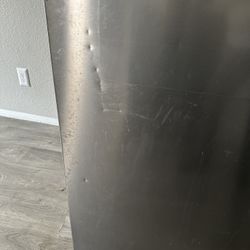 fridge, few dents and scratches 