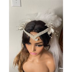 Bridal forehead piece with veil