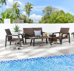 Patio  4-Piece Outdoor Rattan Quick-Drying Conversation Set Retails For $650