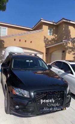 Audi Q5 Black SUV with Roof Rack