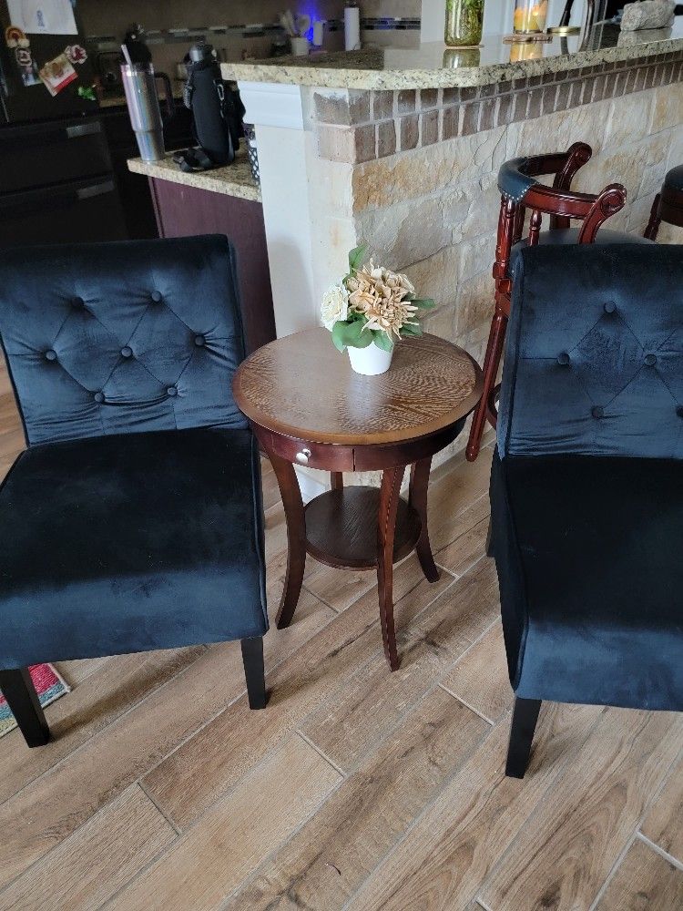 Black Chairs And Bedroom Table
