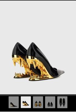 Black and gold fang heels with box