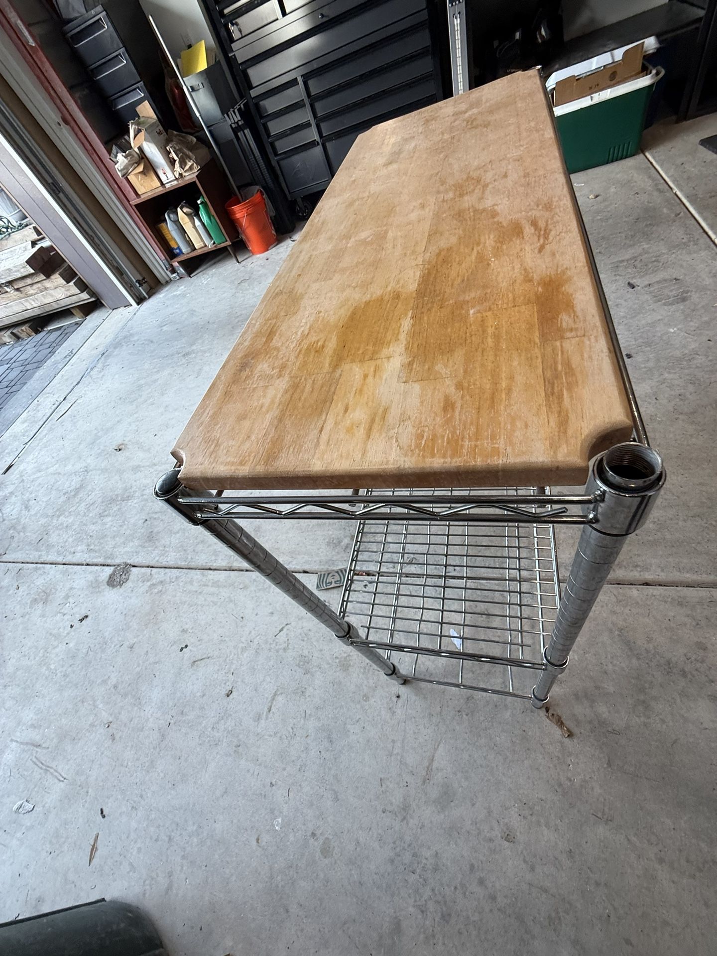 Kitchen storage rack with wine shelf
