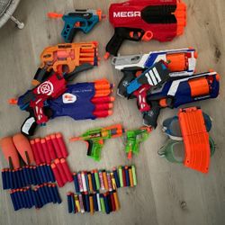 Bunch Of Nerf Guns And Accessories 