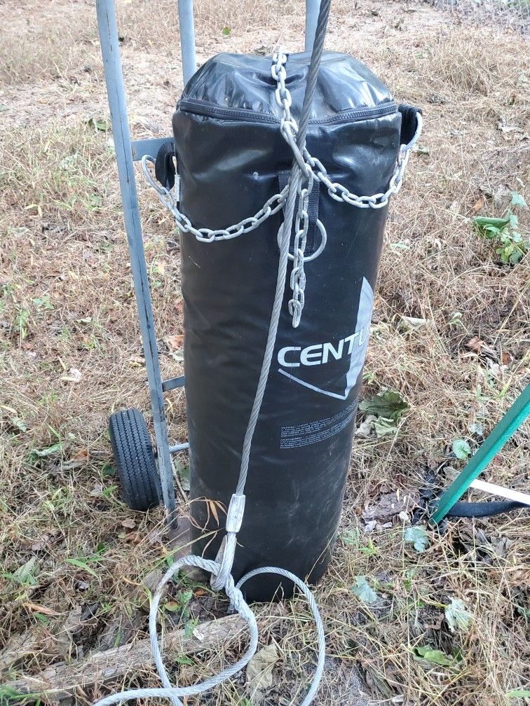 punching bag heavy with everything you need hooks and cable