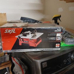 The image displays a box for a Skil 3540-01 (or 3540-02) 7-Inch Wet Tile Saw. 