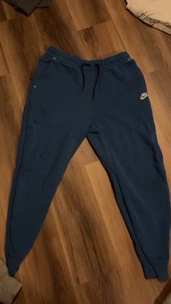 blue nike tech pants