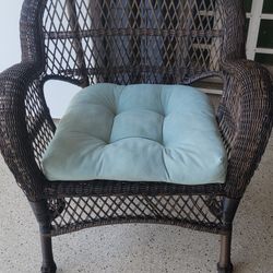Beautiful Wicker Chair With Blue Cushion