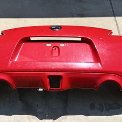 Nissan 370Z OEM Rear Bumper Cover A54 Vibrant Red