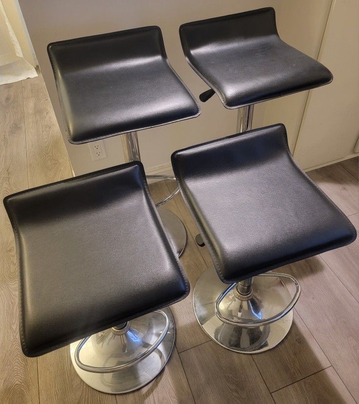 Bar Stools, good condition, adjustable, swivel, PU Leather ($15 each) 