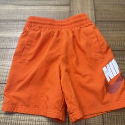 Nike Boys’ Orange shorts, Size Small